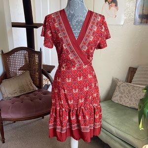 Red patterned wrap dress, brand new with tags.